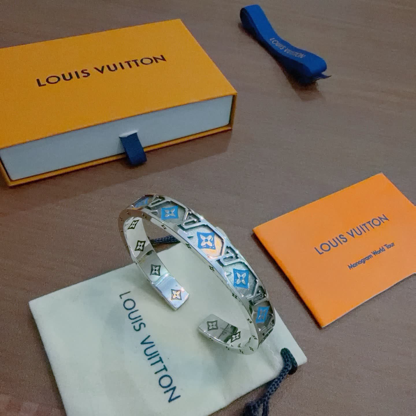 Louis Vuitton Silver Bracelet with Blue and Orange Accents